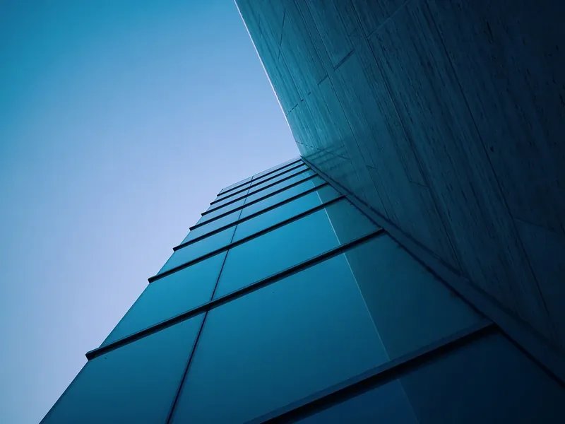 Glass curtain-wall facade of a commercial office building